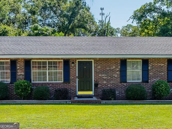 a view of house with a swimming pool