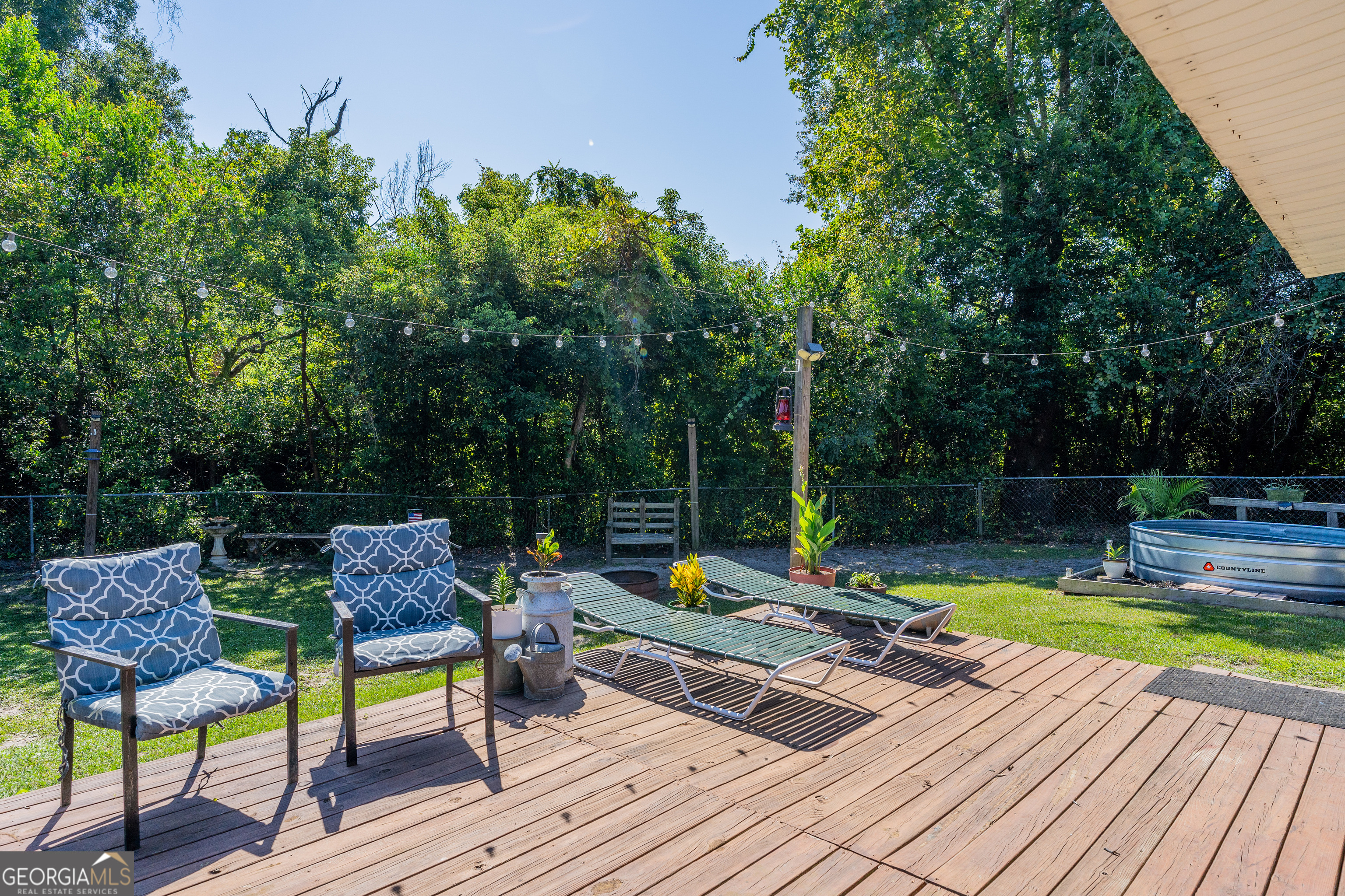 420 Jackson Street Blackshear, GA 31516 - Photo 11 of 31 a view of swimming pool with chairs