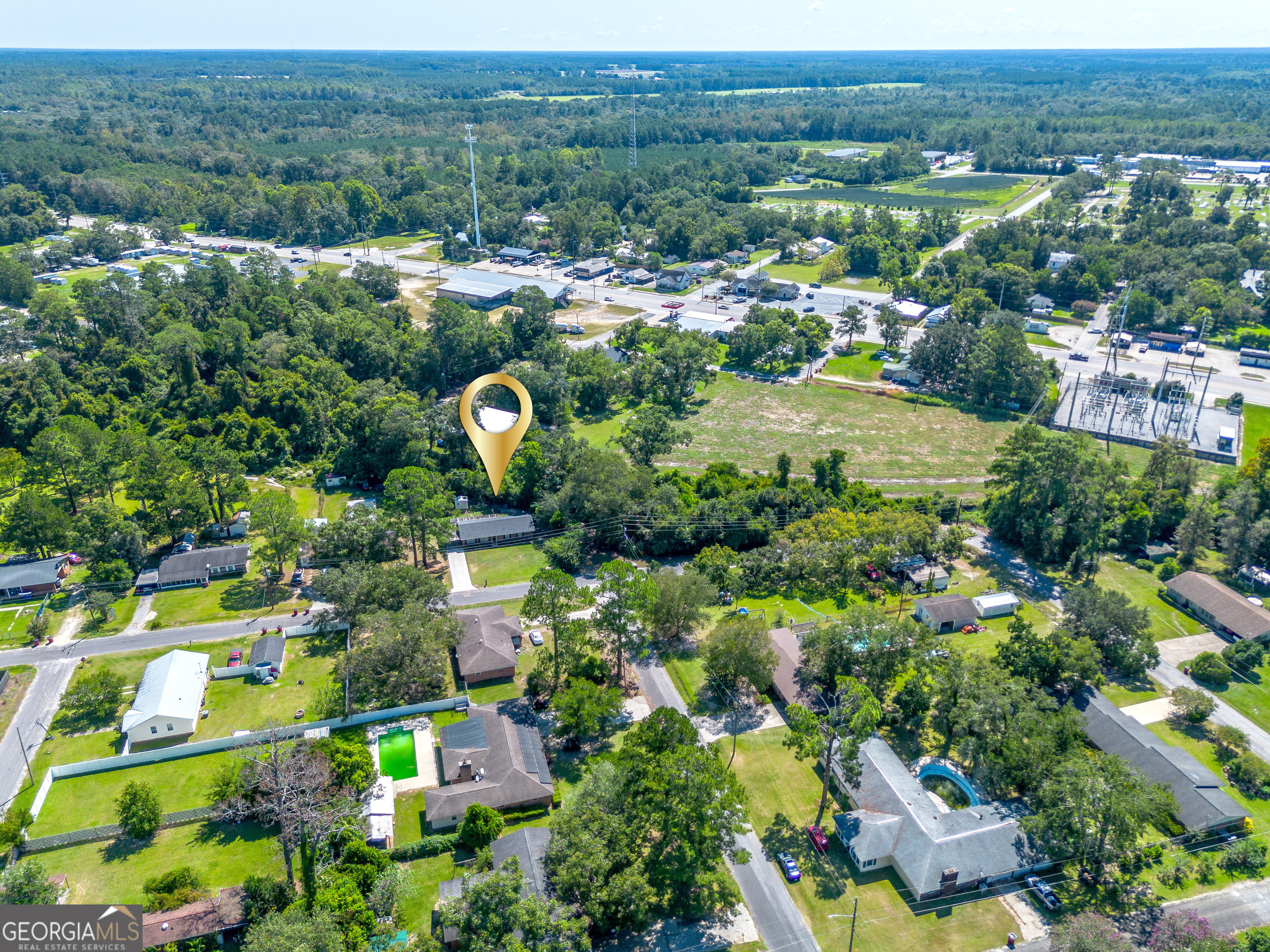 420 Jackson Street Blackshear, GA 31516 - Photo 13 of 31 an aerial view of residential houses with outdoor space and river
