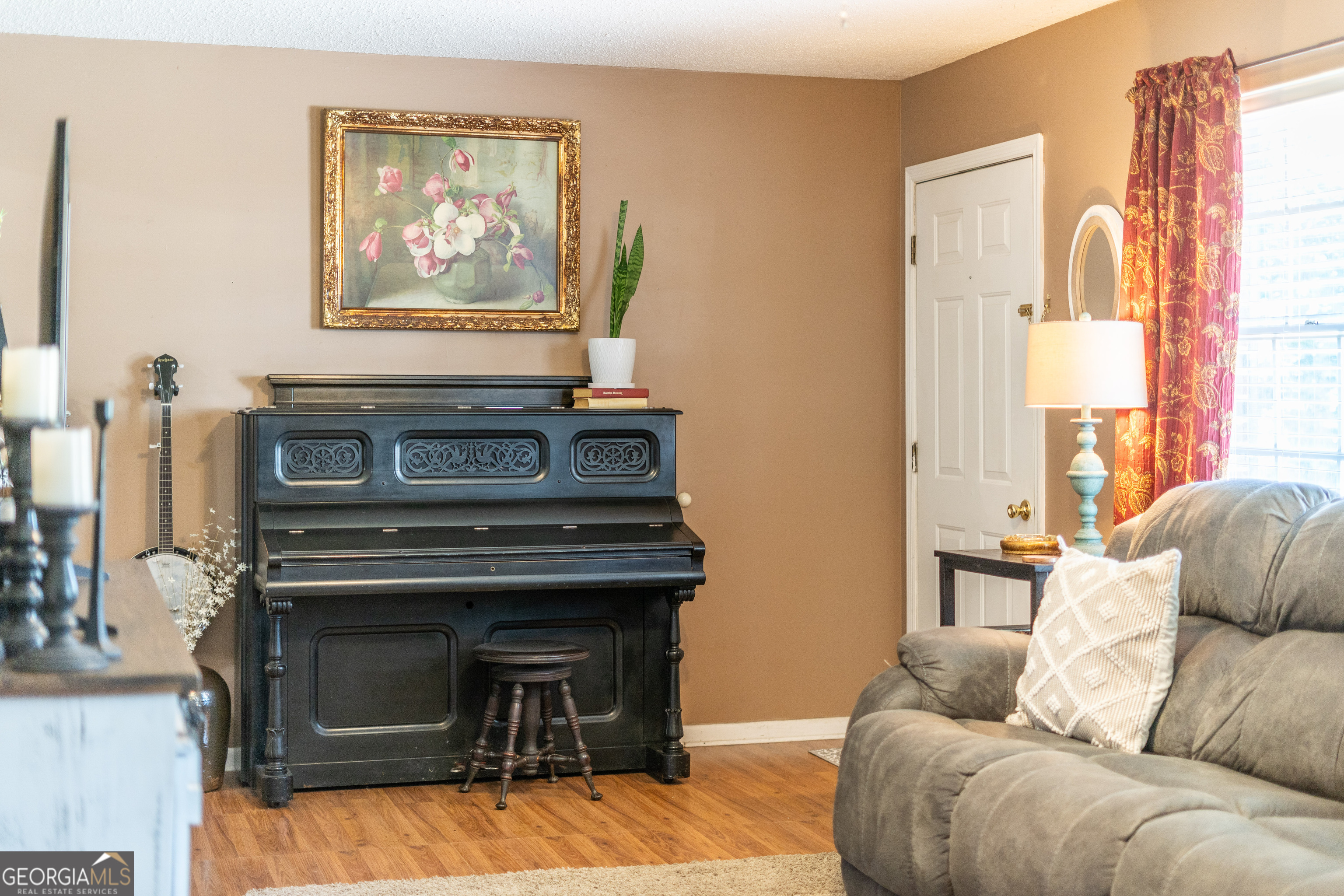 420 Jackson Street Blackshear, GA 31516 - Photo 30 of 31 a living room with furniture and a fireplace