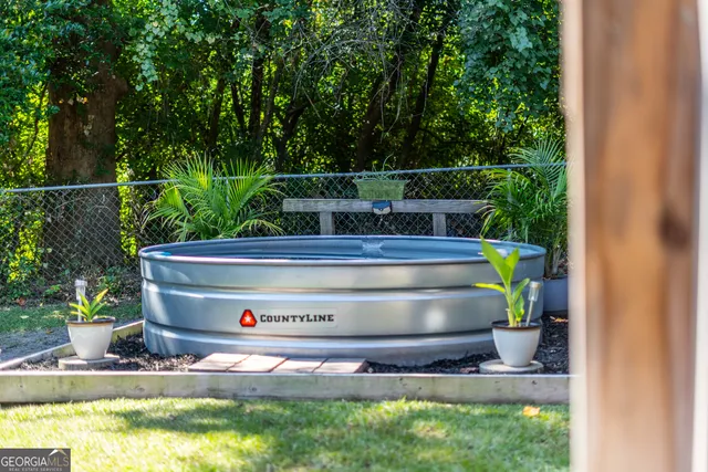 a view of fountain in front of house