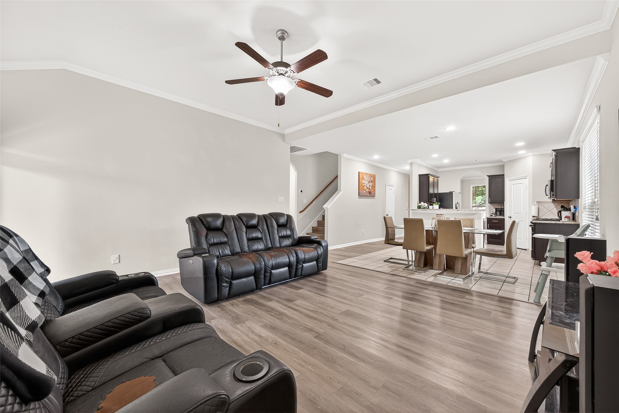 8 Landscape Court Conroe, TX 77301 - Photo 10 of 43 a living room with furniture and wooden floor