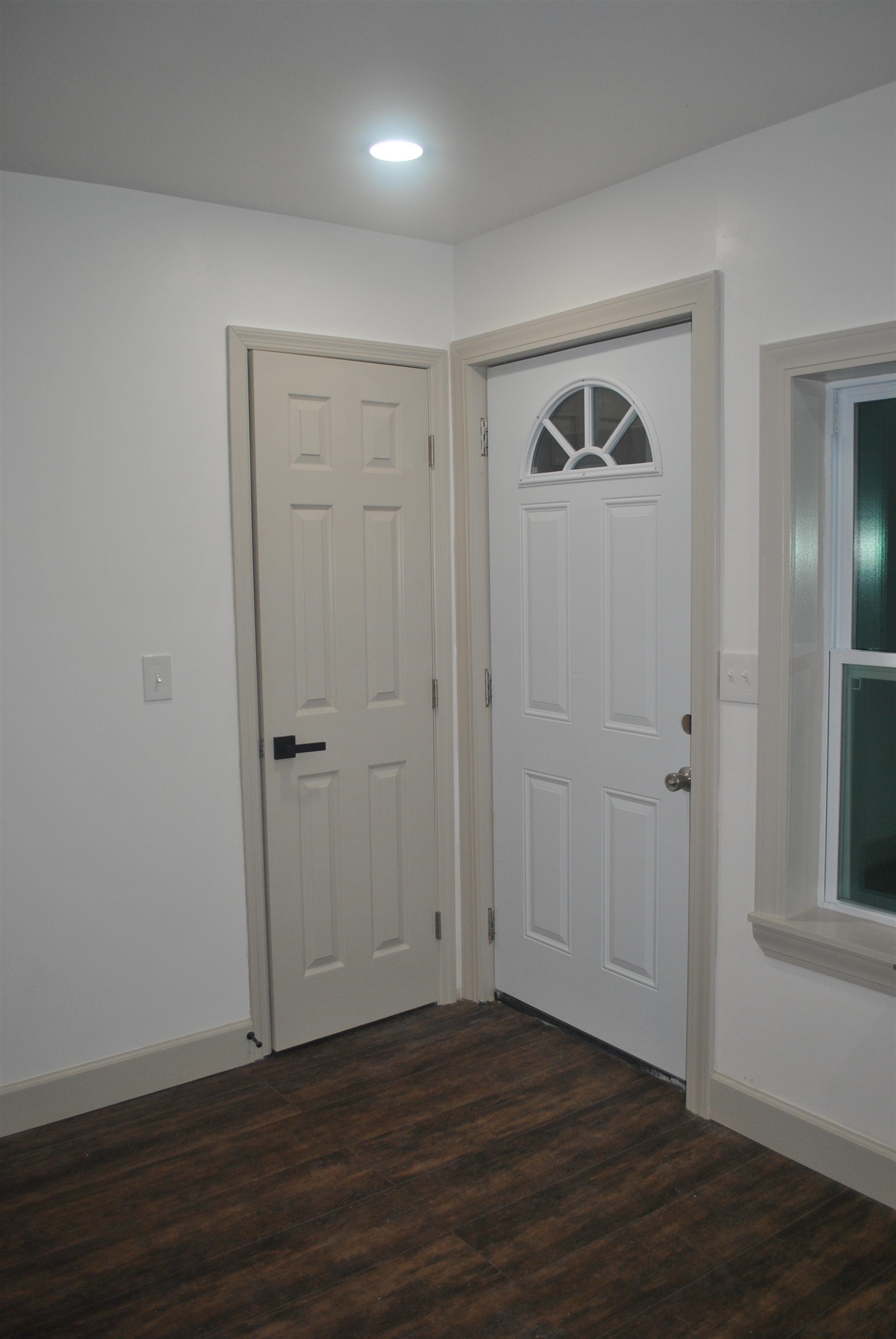 815 North Congdon Street Georgetown, SC 29440 - Photo 5 of 28 Entrance foyer featuring dark wood-style flooring and baseboards
