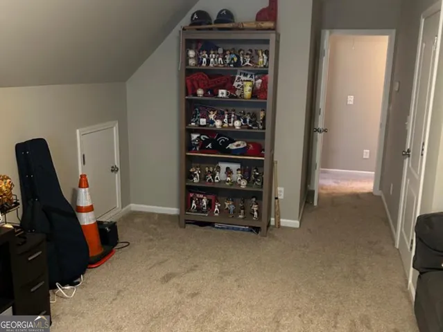 a view of workspace with window and furniture