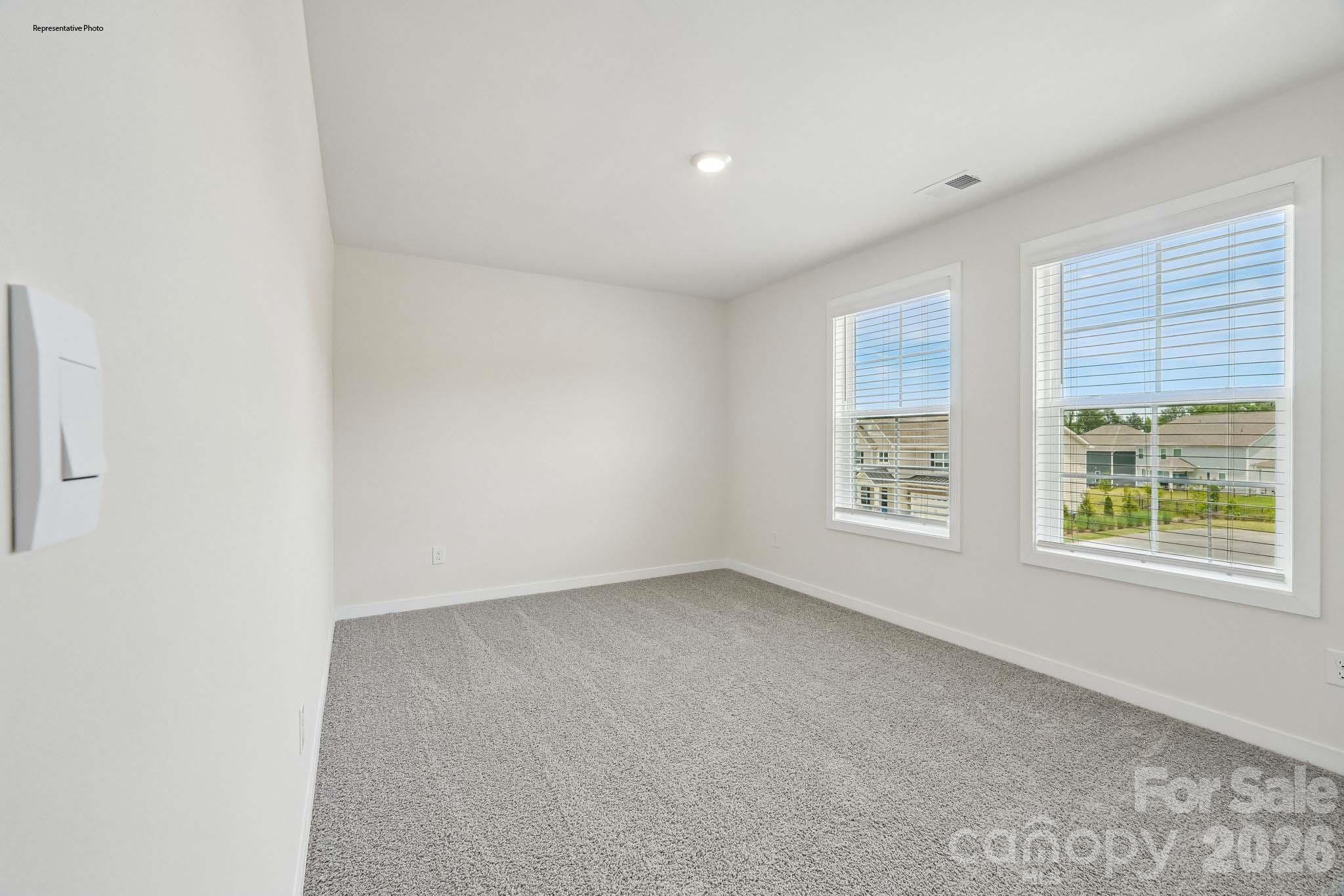 541 Mahogany Road York, SC 29745 - Photo 20 of 32 an empty room with windows