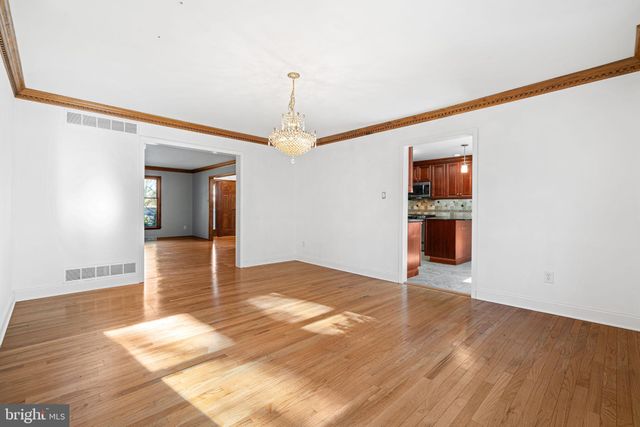 a view of a livingroom with wooden floor