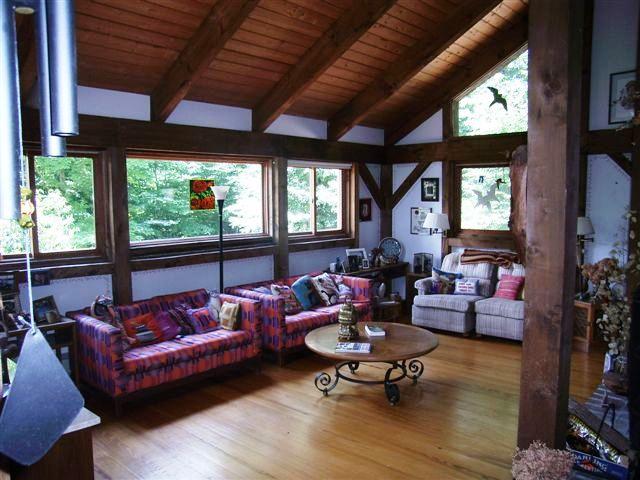 76 Tyringham Road Otis, MA 01253 - Photo 4 of 6 a living room with furniture and a large window