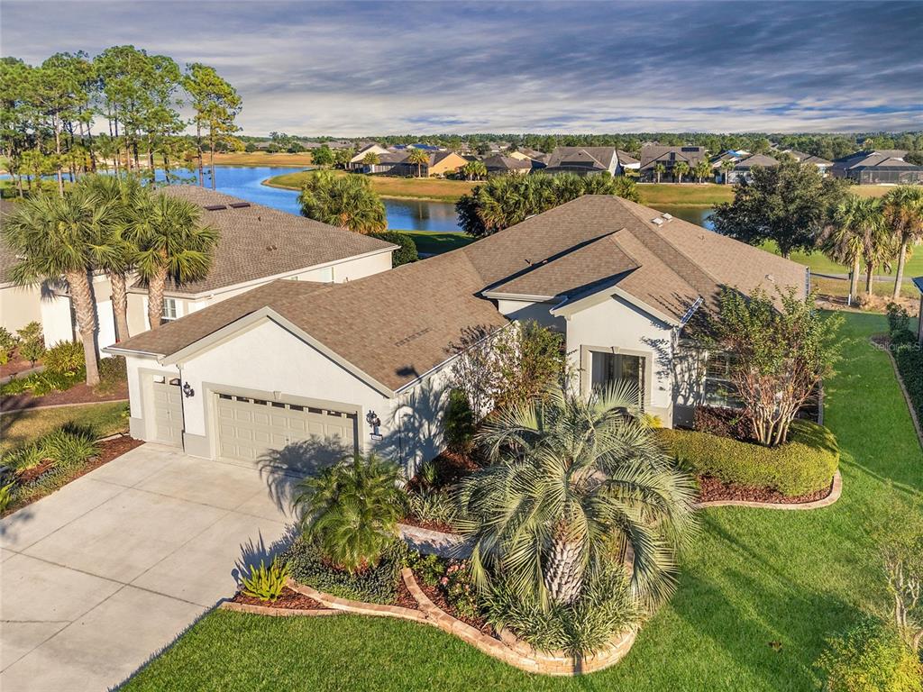 6671 Southwest 97th Terrace Road Ocala, FL 34481 - Photo 1 of 1 an aerial view of residential houses with outdoor space