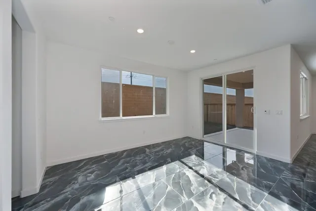 a bathroom with a toilet and a sink