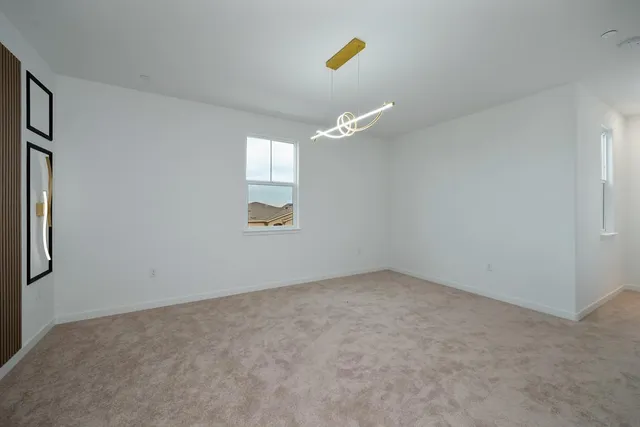 a bathroom with a granite countertop sink a large mirror a shower and bathtub