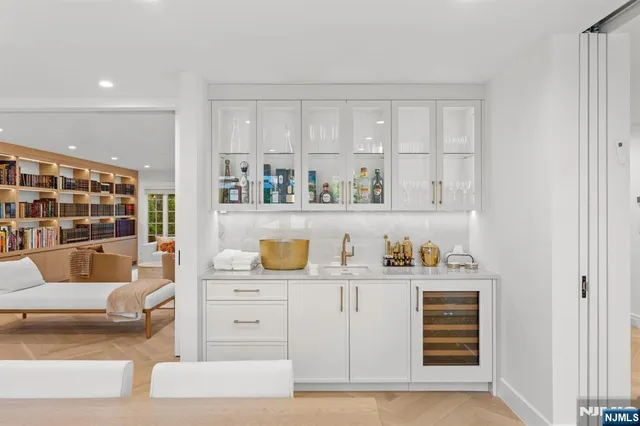 a view of kitchen with cabinets and wooden floor