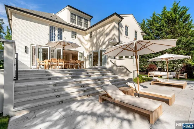 a view of a building with sitting area