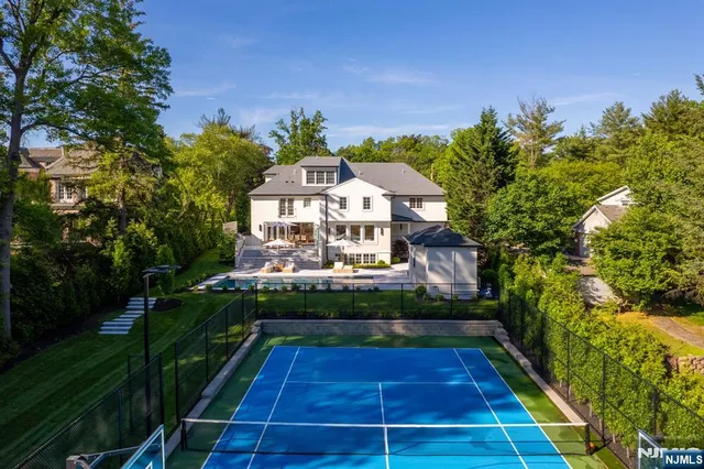 a front view of a house with yard