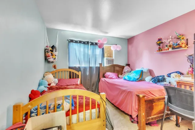 a bedroom with furniture and a bed