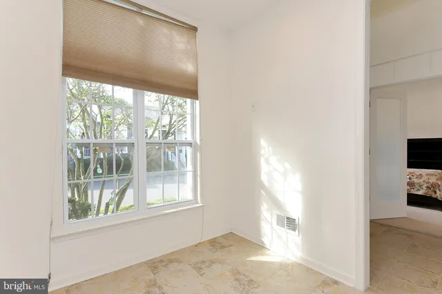 a view of empty room with a window