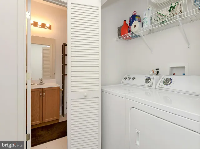 a utility room with dryer and washer
