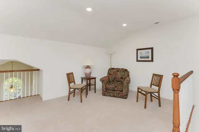 a workspace with furniture and a window