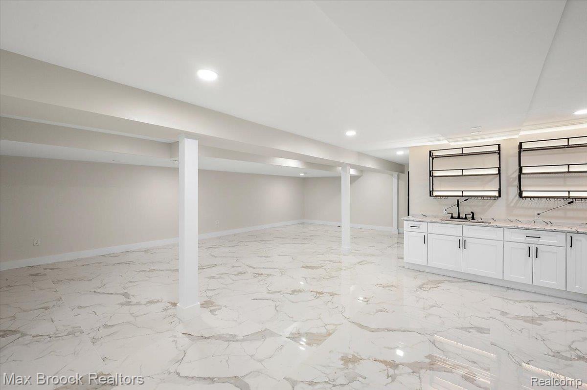 4597 Clarkston Road Clarkston, MI 48348 - Photo 52 of 74 Expansive open-concept space featuring polished tile flooring and recessed lighting