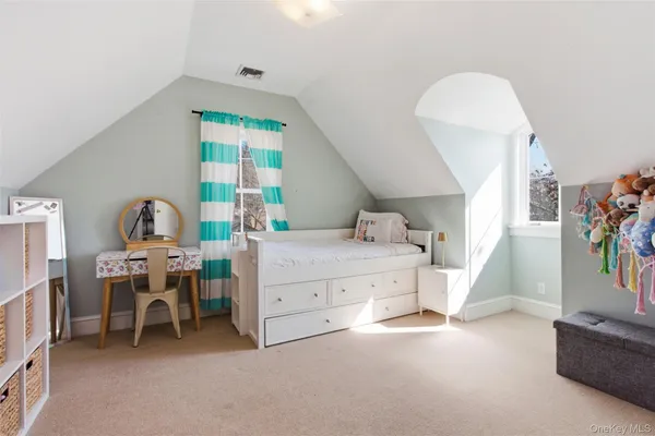 a room with furniture and a window