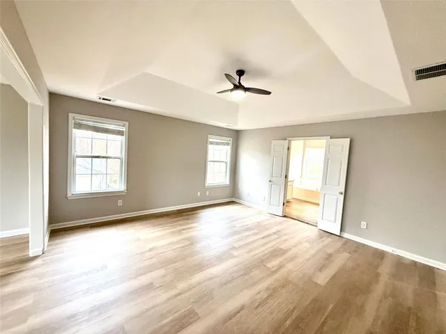 a bathroom with a tub and shower