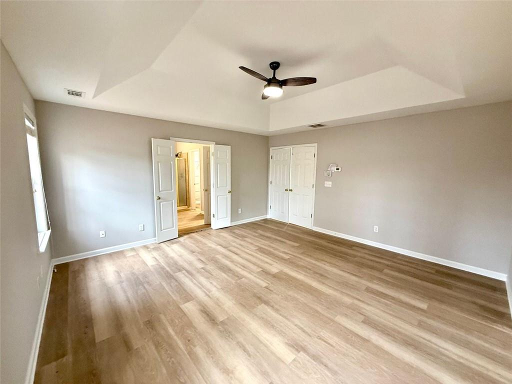 1505 Wedgefield Court Alpharetta, GA 30004 - Photo 28 of 61 a view of empty room with wooden floor and fan