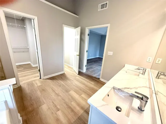 a view of an empty room with a window