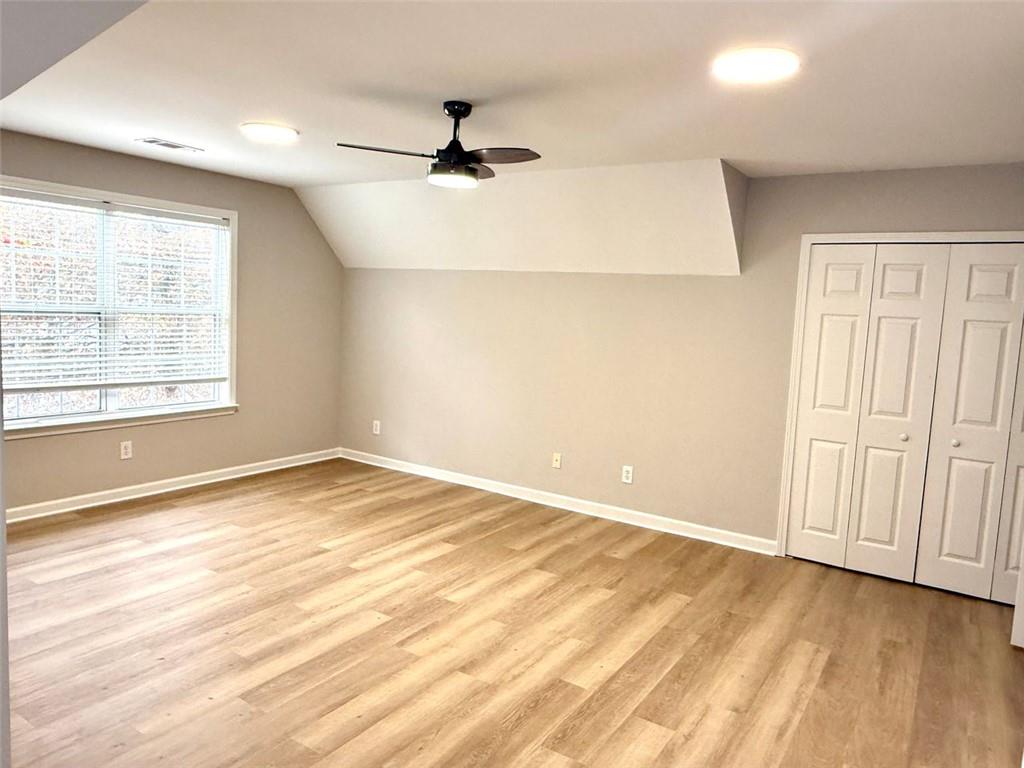 1505 Wedgefield Court Alpharetta, GA 30004 - Photo 45 of 61 an empty room with a empty space and windows