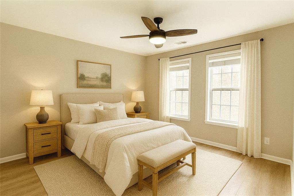 1505 Wedgefield Court Alpharetta, GA 30004 - Photo 46 of 61 a bedroom with a large bed and a window