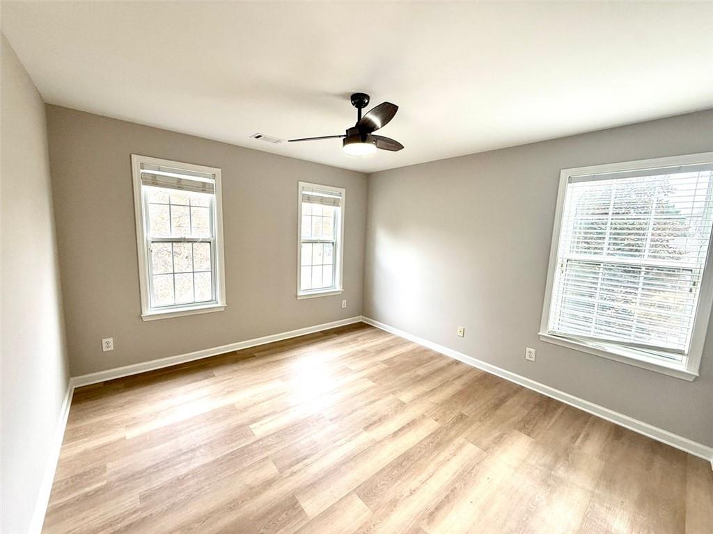 1505 Wedgefield Court Alpharetta, GA 30004 - Photo 50 of 61 a view of an empty room with a window