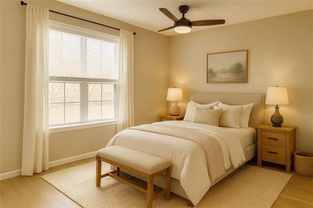 1505 Wedgefield Court Alpharetta, GA 30004 - Photo 52 of 61 a bedroom with a bed and a window