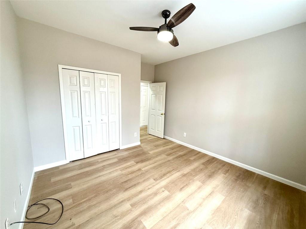 1505 Wedgefield Court Alpharetta, GA 30004 - Photo 55 of 61 a view of empty room with ceiling fan