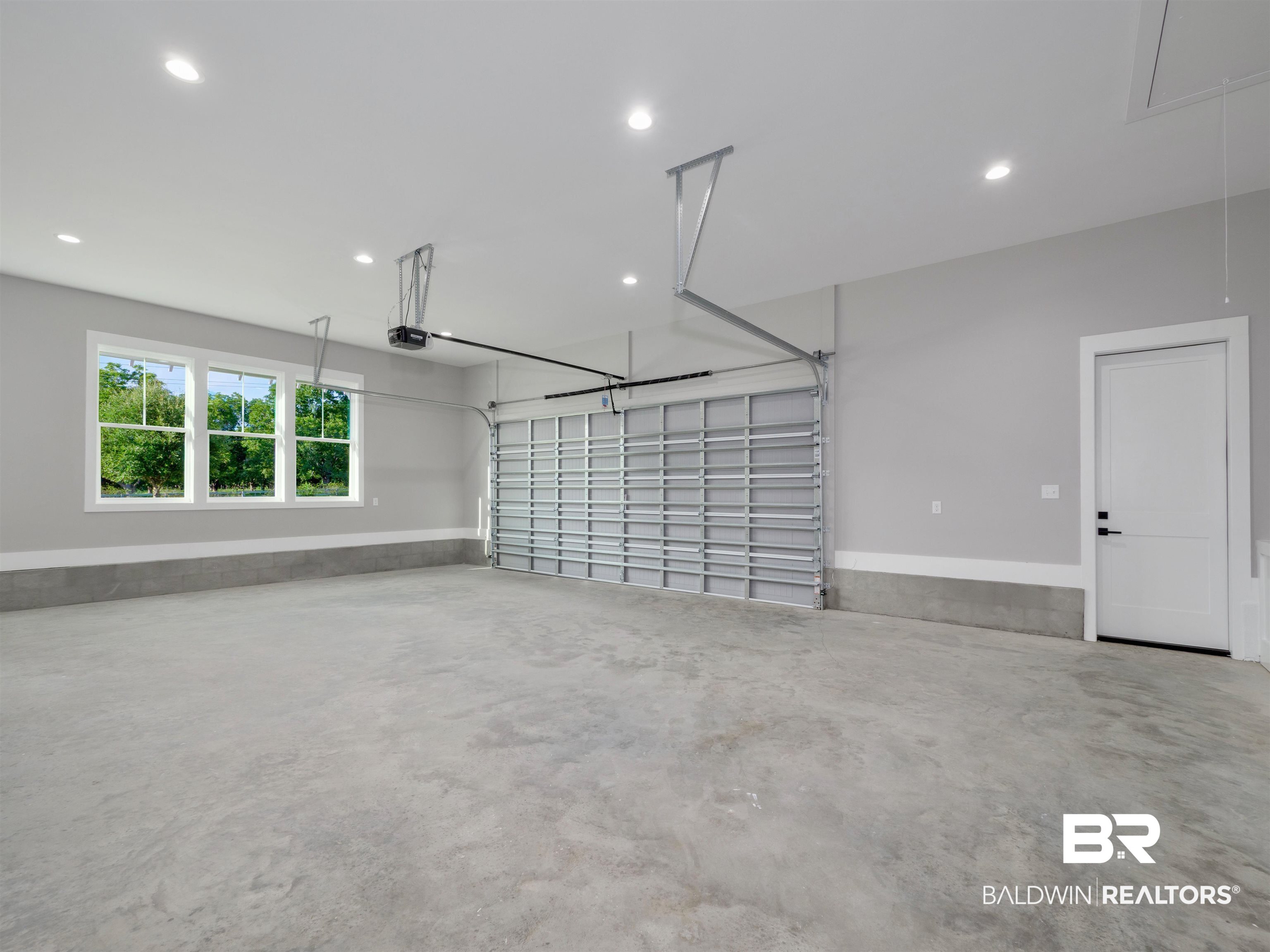 10912 Catania Avenue Fairhope, AL 36532 - Photo 52 of 54 Two car garage situated on the left side of the home with a side entry