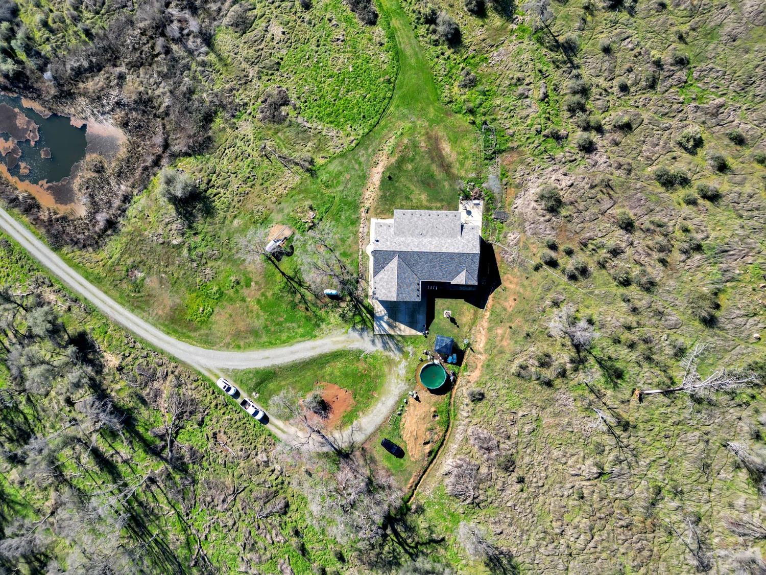 6718 Cross Star Trail Loma Rica, CA 95901 - Photo 44 of 54 an aerial view of a house with a yard