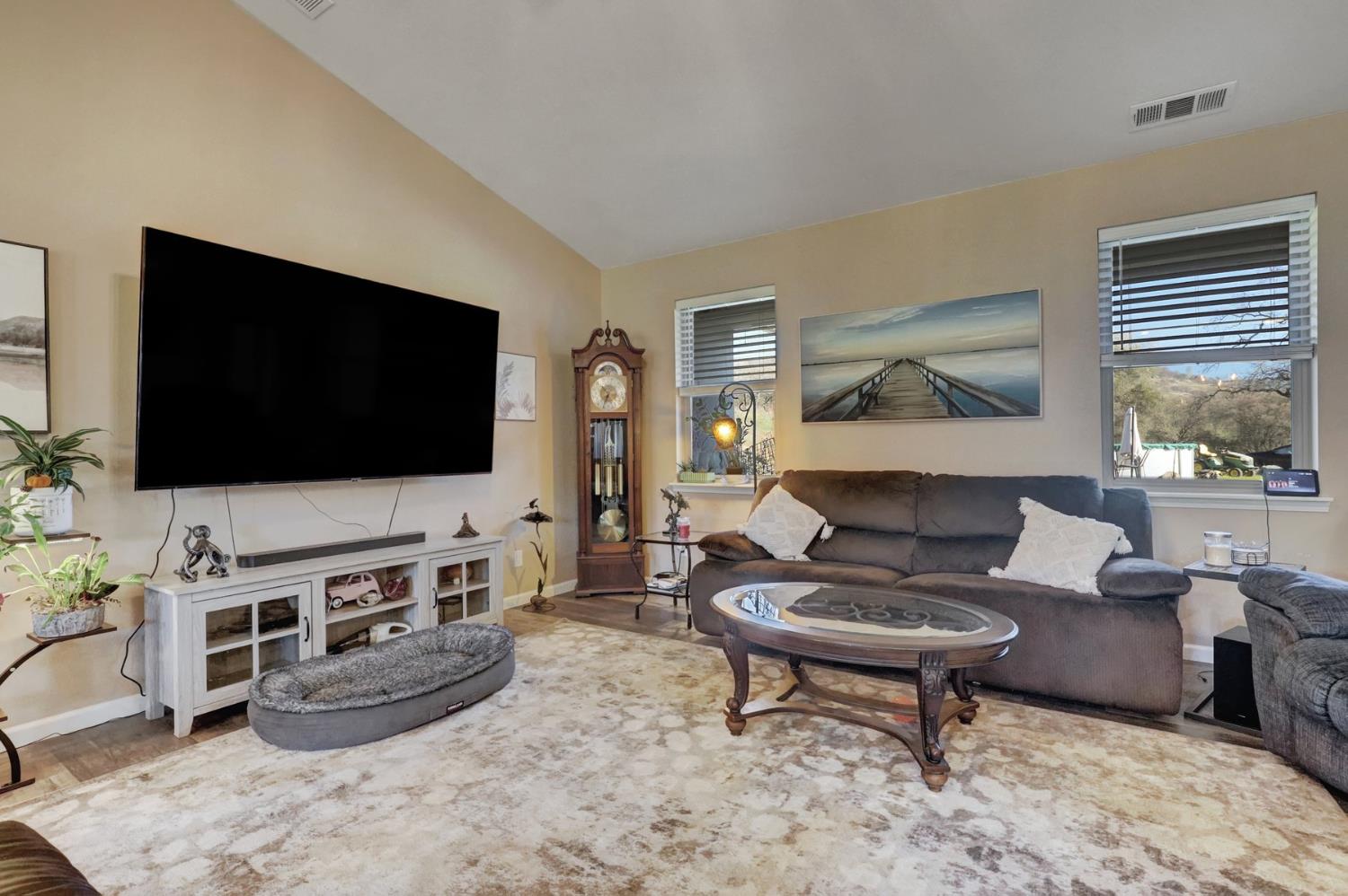 6718 Cross Star Trail Loma Rica, CA 95901 - Photo 6 of 54 a living room with furniture and a flat screen tv