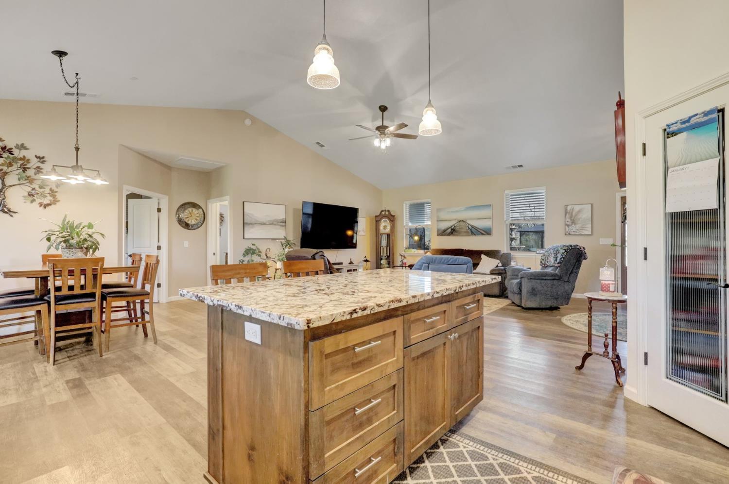 6718 Cross Star Trail Loma Rica, CA 95901 - Photo 9 of 54 a kitchen with a stove and a chandelier