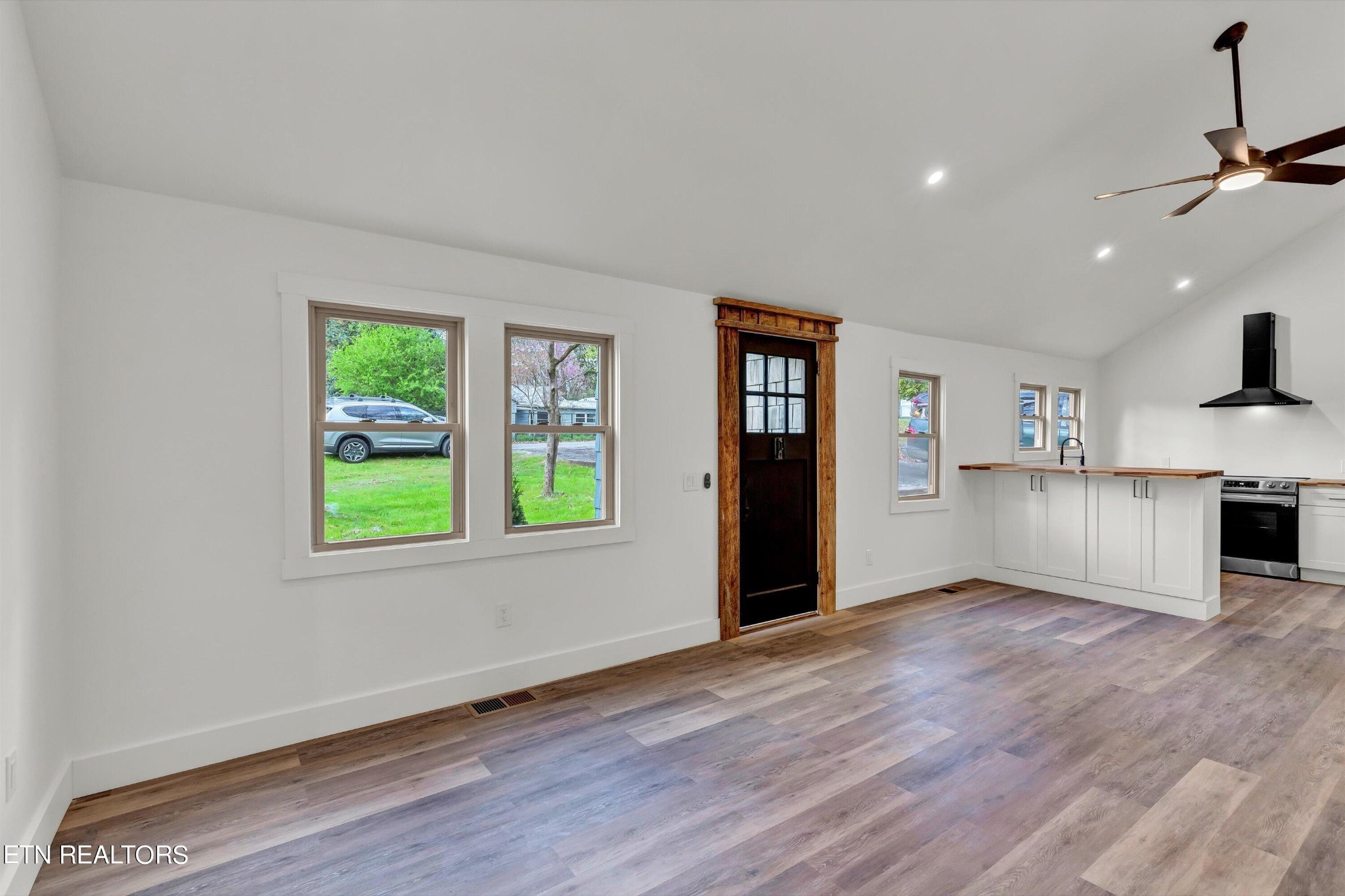 2209 Belt Road Knoxville, TN 37920 - Photo 11 of 36 wooden floor in an empty room with a window