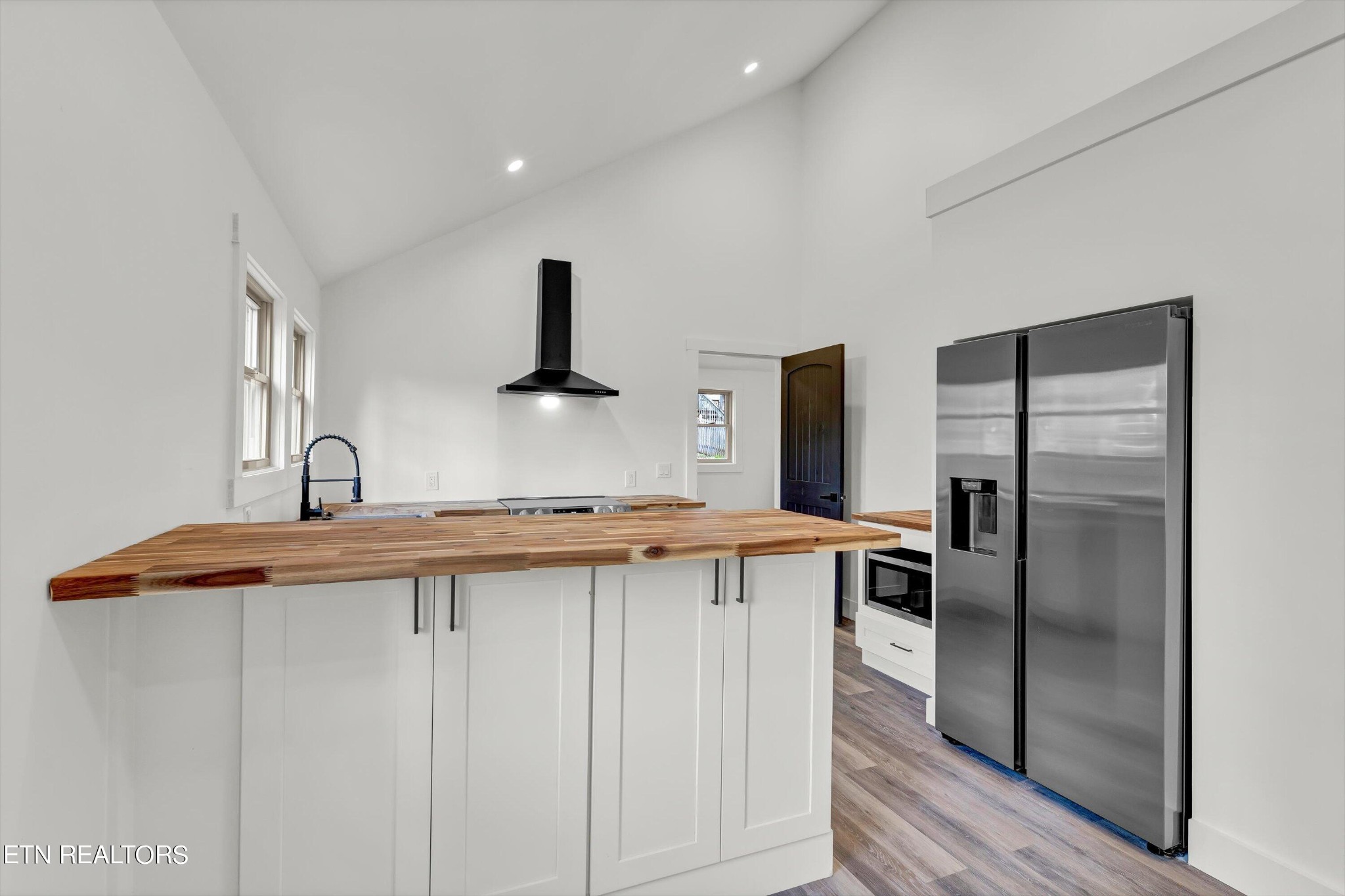 2209 Belt Road Knoxville, TN 37920 - Photo 13 of 36 a kitchen with stainless steel appliances granite countertop a sink and a refrigerator
