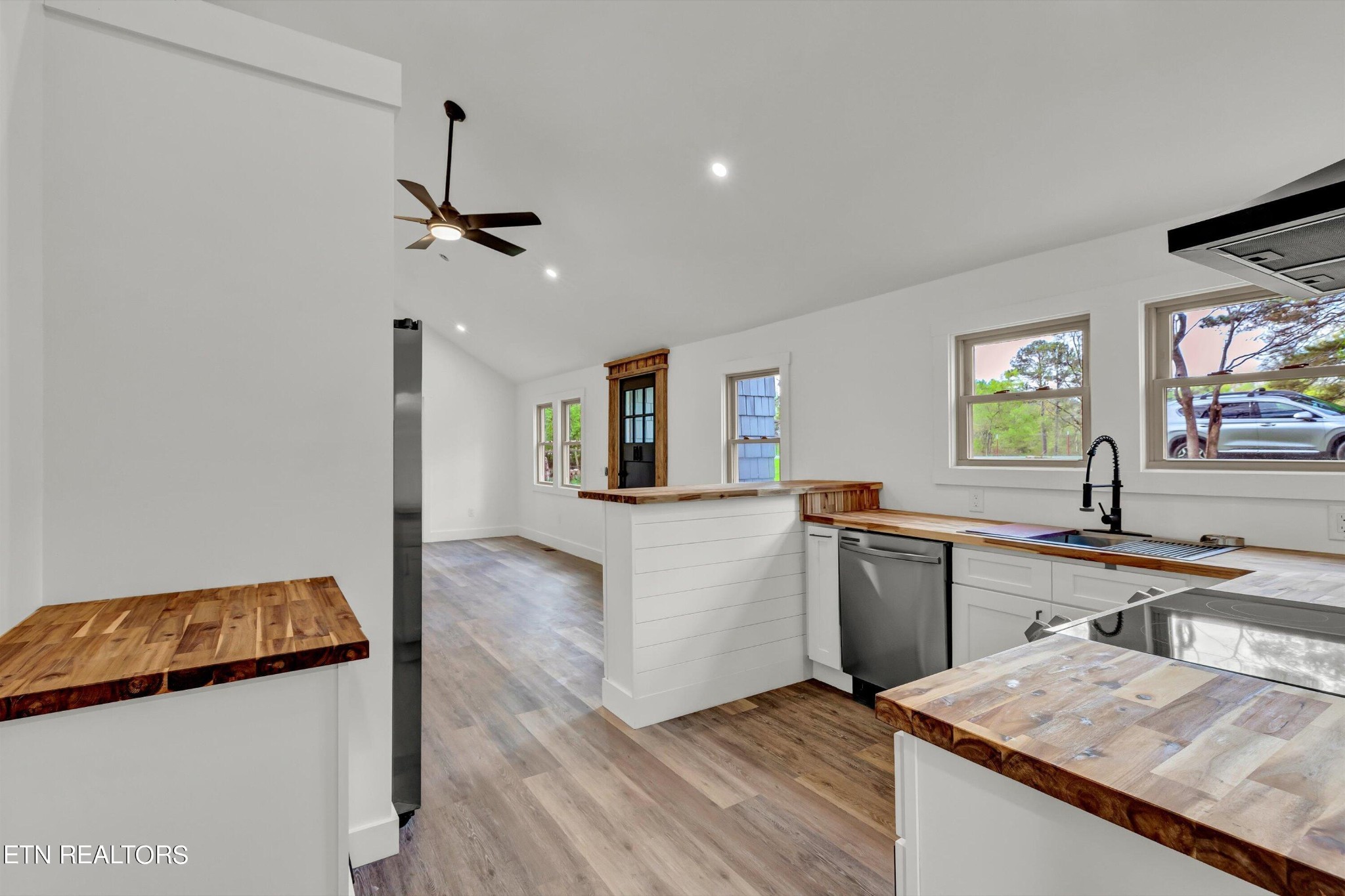 2209 Belt Road Knoxville, TN 37920 - Photo 14 of 36 a kitchen with granite countertop cabinets stainless steel appliances and a dining table