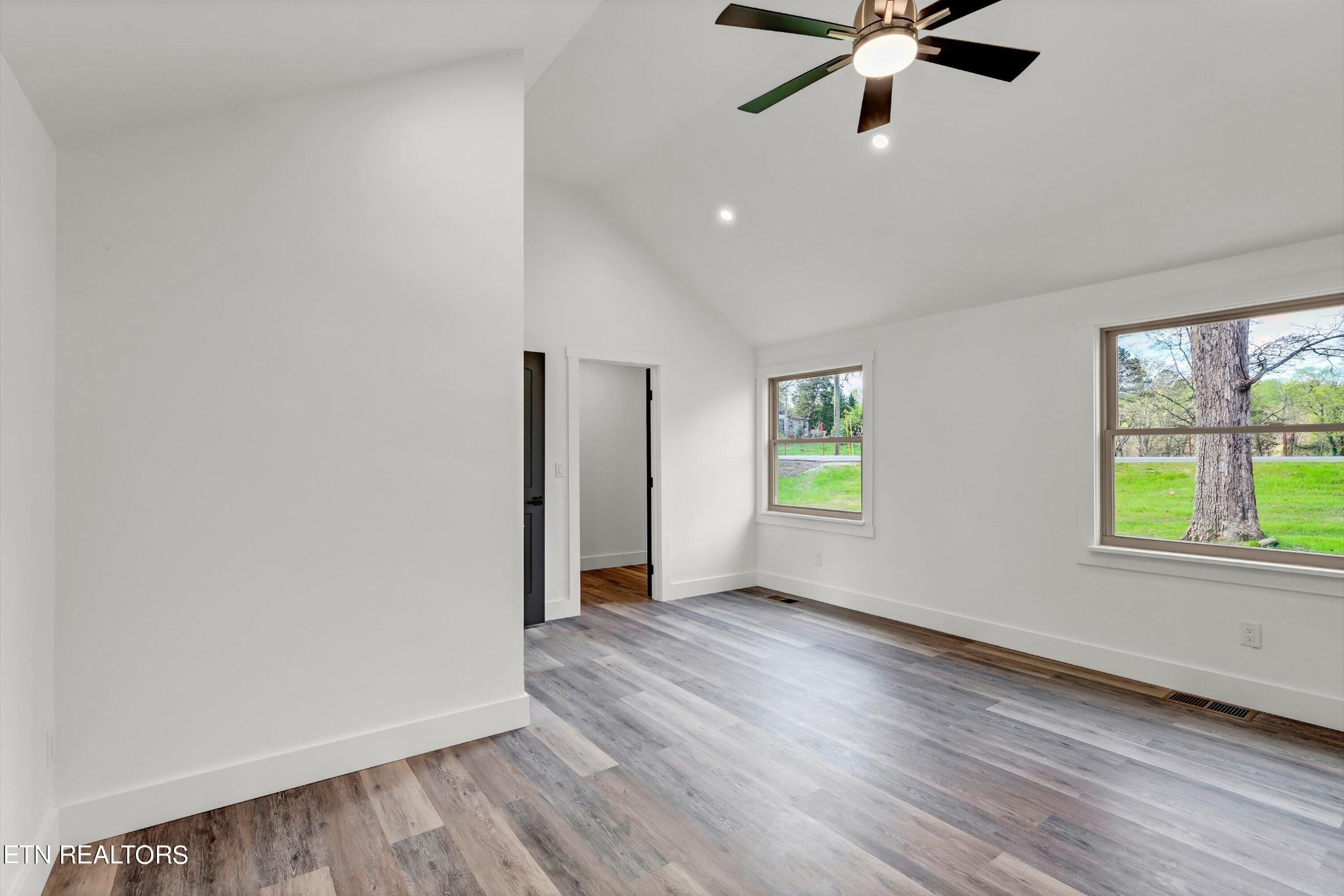 2209 Belt Road Knoxville, TN 37920 - Photo 18 of 36 wooden floor in an empty room with a window