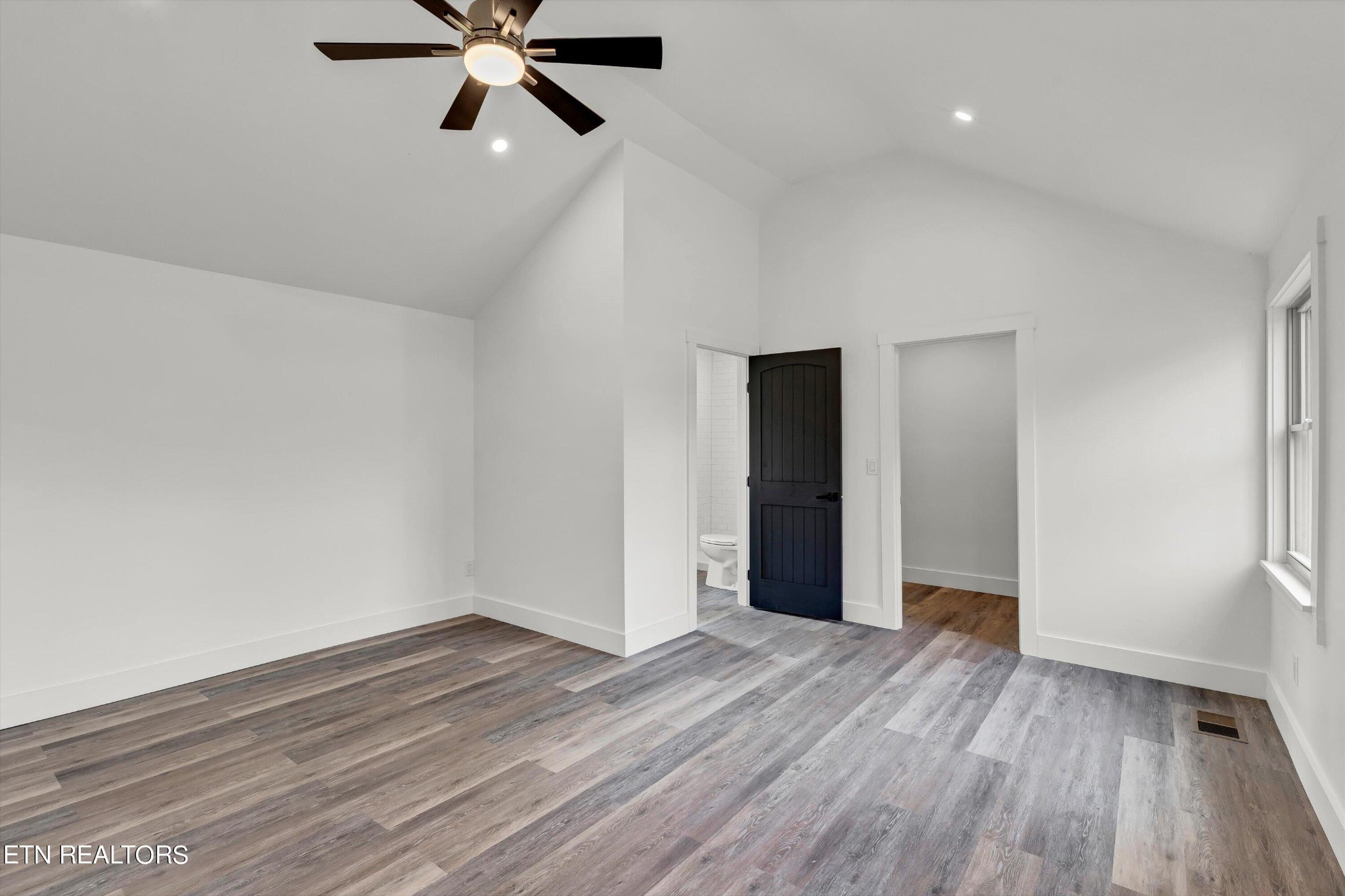 2209 Belt Road Knoxville, TN 37920 - Photo 19 of 36 wooden floor in an empty room with a window