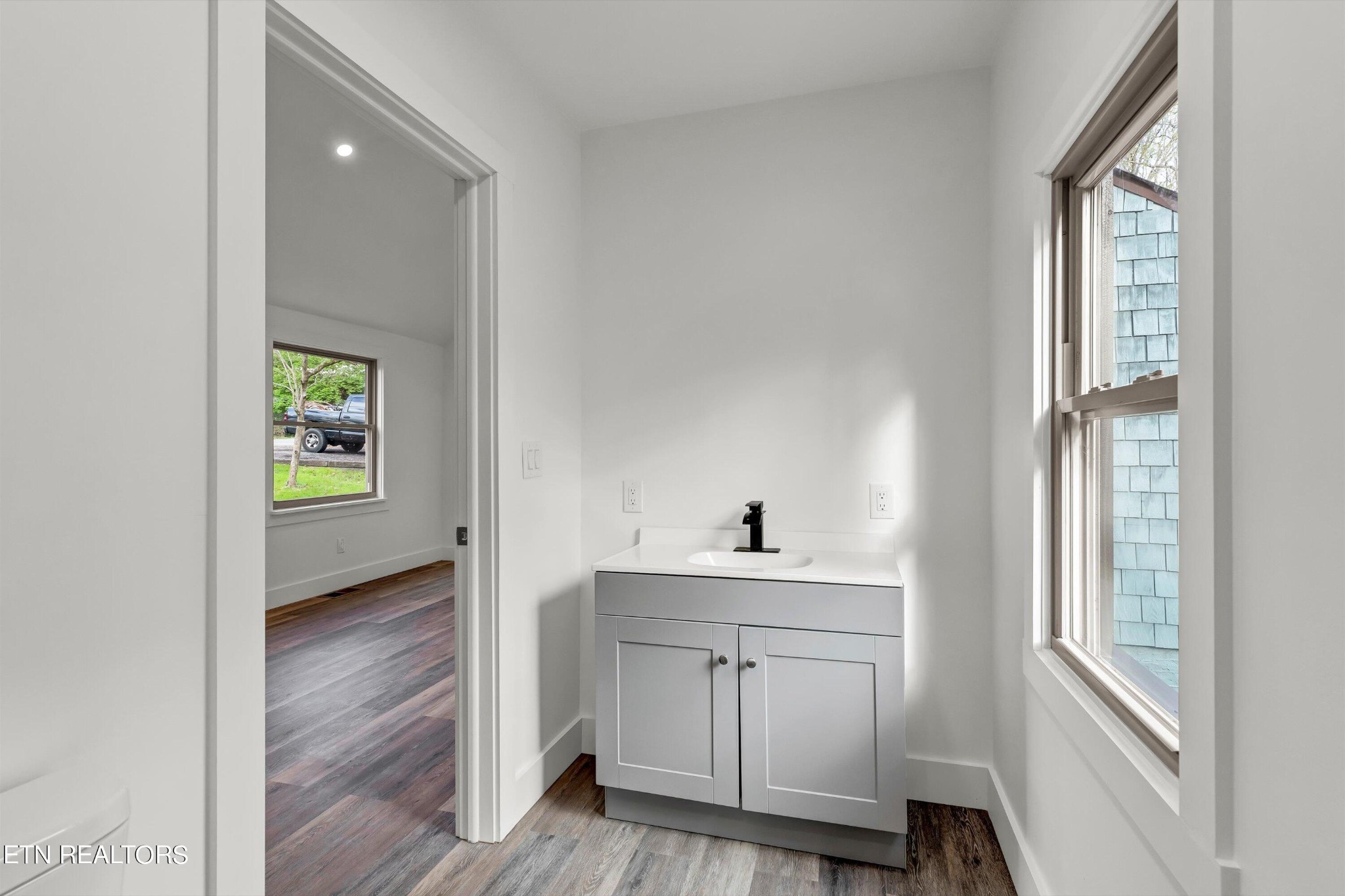 2209 Belt Road Knoxville, TN 37920 - Photo 21 of 36 a view of hallway with window and wooden floor