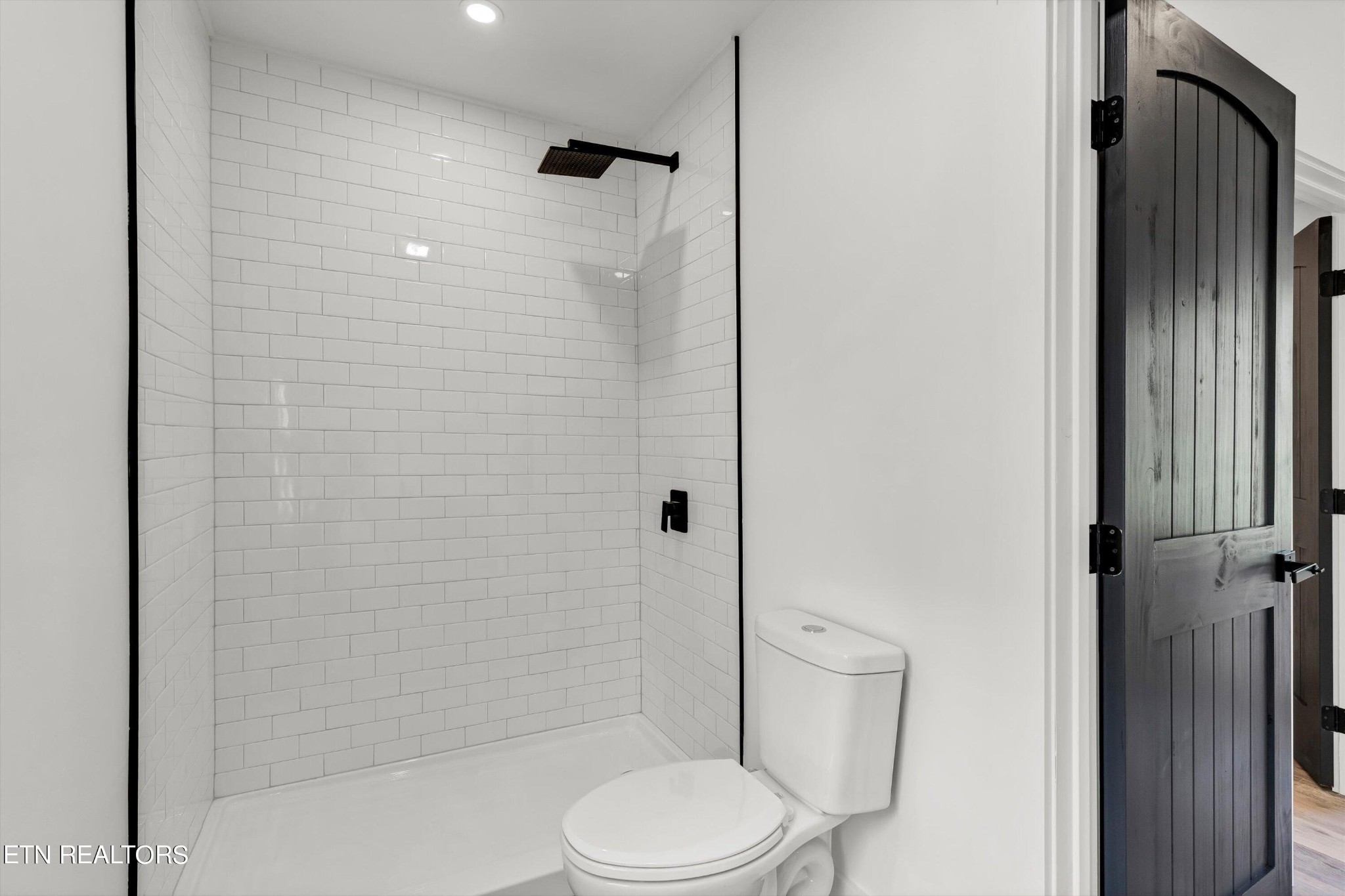 2209 Belt Road Knoxville, TN 37920 - Photo 22 of 36 a white toilet sitting next to a bathroom sink