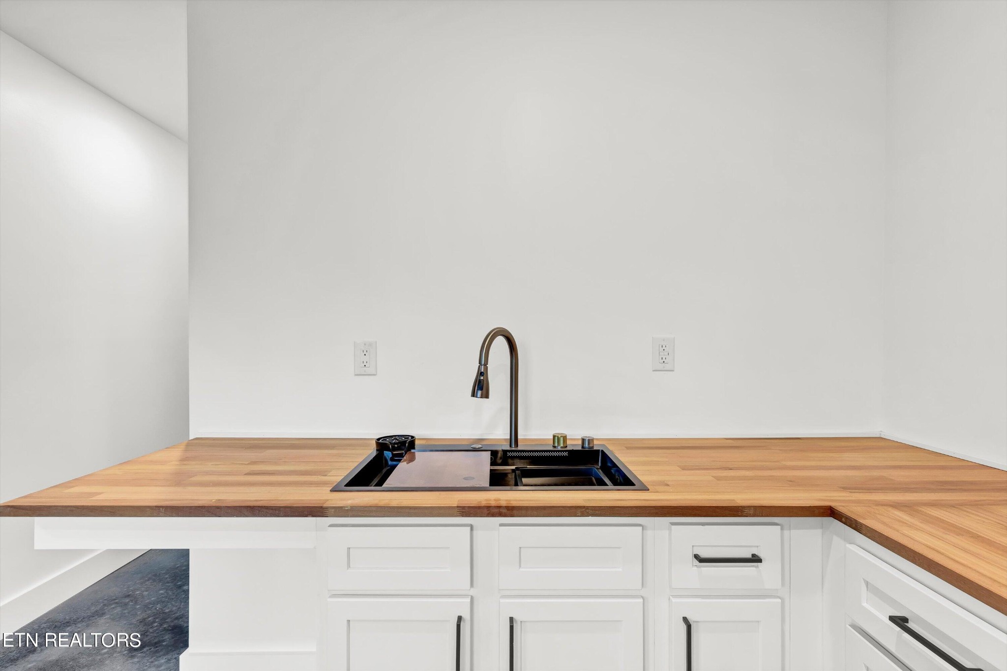 2209 Belt Road Knoxville, TN 37920 - Photo 33 of 36 a kitchen with a sink and cabinets