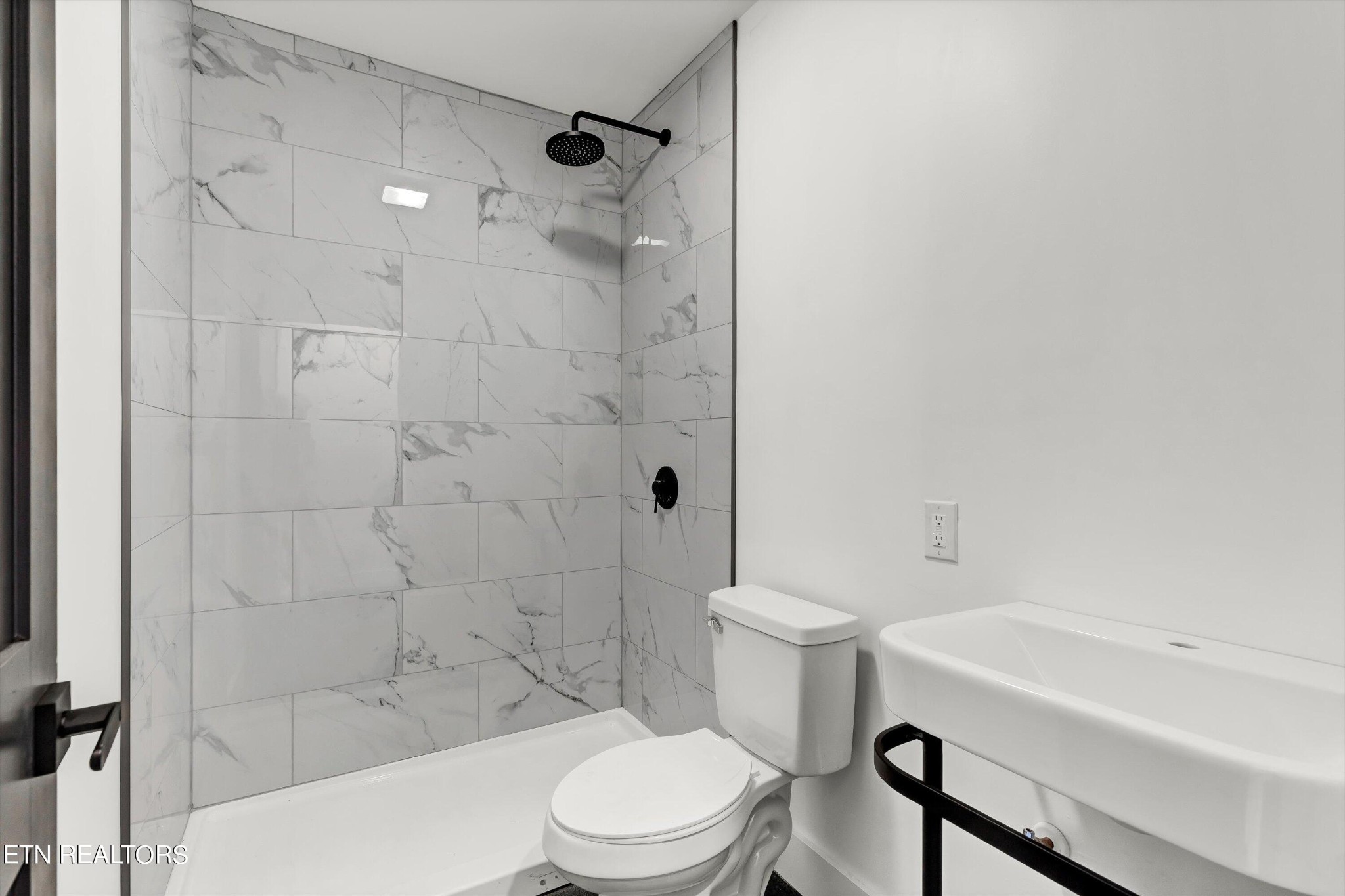 2209 Belt Road Knoxville, TN 37920 - Photo 34 of 36 a bathroom with a sink toilet and shower