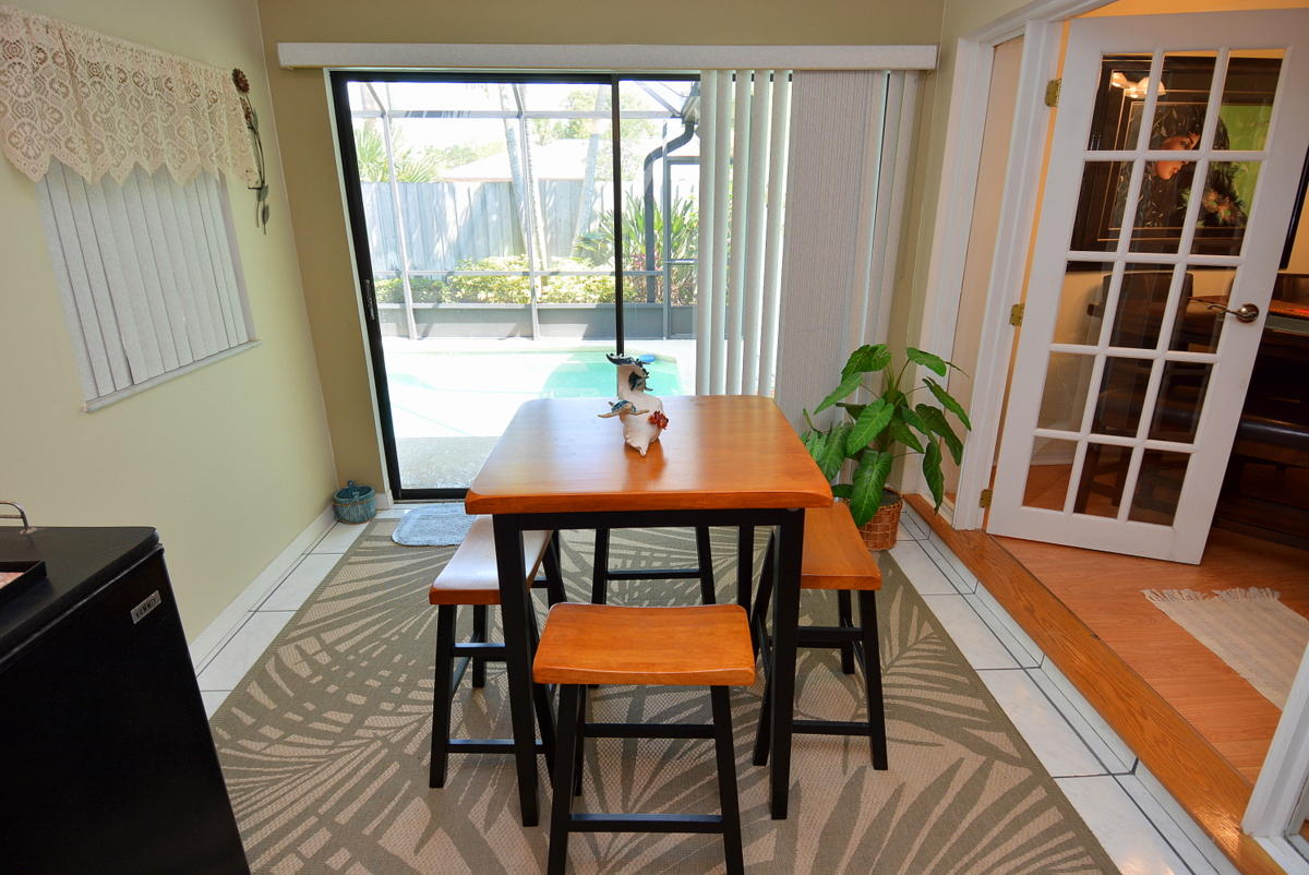 4562 Southeast Shady Ridge Lane Stuart, FL 34997 - Photo 10 of 20 Florida Room Dining