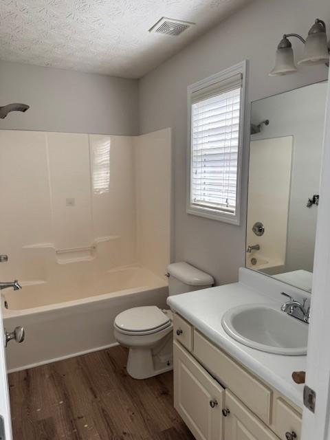 25 Jefferson Walk Circle Jefferson, GA 30549 - Photo 14 of 16 a bathroom with a sink a toilet and a bathtub