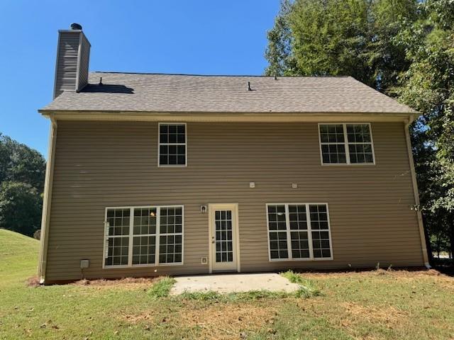 25 Jefferson Walk Circle Jefferson, GA 30549 - Photo 16 of 16 a front view of a house with a yard