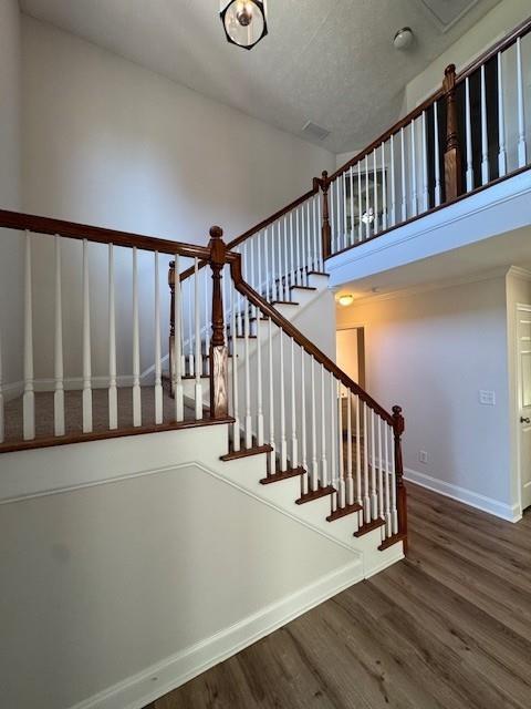 25 Jefferson Walk Circle Jefferson, GA 30549 - Photo 3 of 16 a view of staircase with railing and white walls