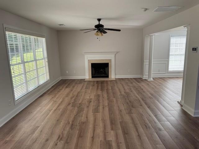 25 Jefferson Walk Circle Jefferson, GA 30549 - Photo 7 of 16 wooden floor fireplace and windows in an empty room