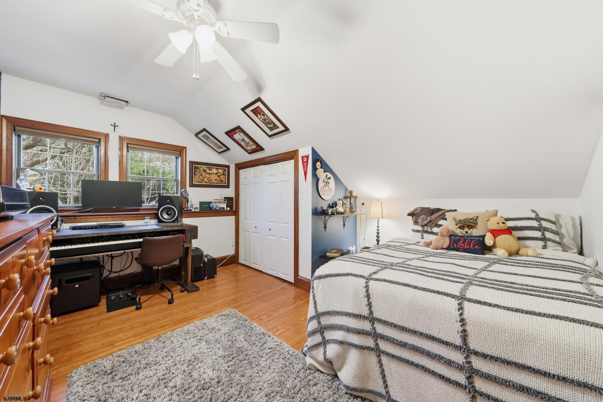 1202 Shore Road Northfield, NJ 08225 - Photo 34 of 57 a bedroom with furniture and a rug